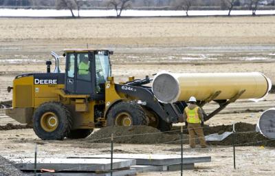 Pipe is delivered to the Northern Water's Southern Water Supply Project, which is under construction north of McIntosh Lake in Longmont. The project,which is expected to be finished in 2020, will deliver water to Boulder, Berthoud and Left Hand and Longs Peak water districts. (Lewis Geyer / Times-Call Staff Photographer)